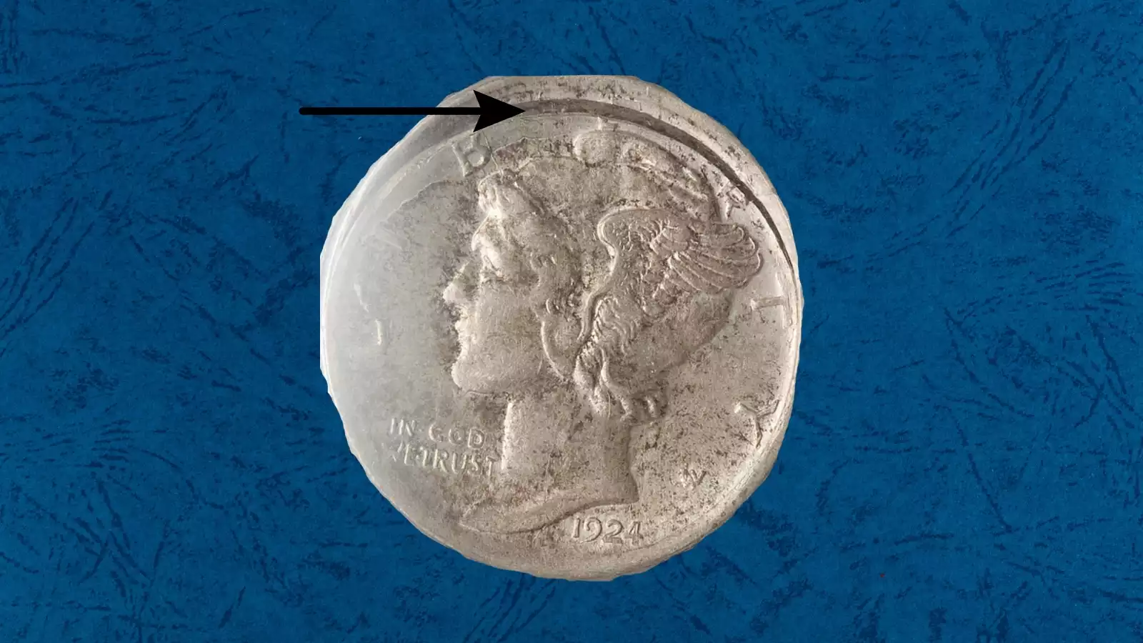 1924-D Mercury dime retained split planchet error showing partial delamination of the planchet layers